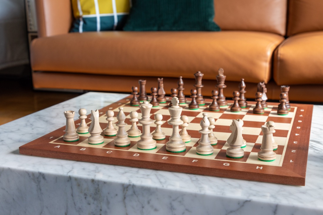 A chess set laid out mid-game